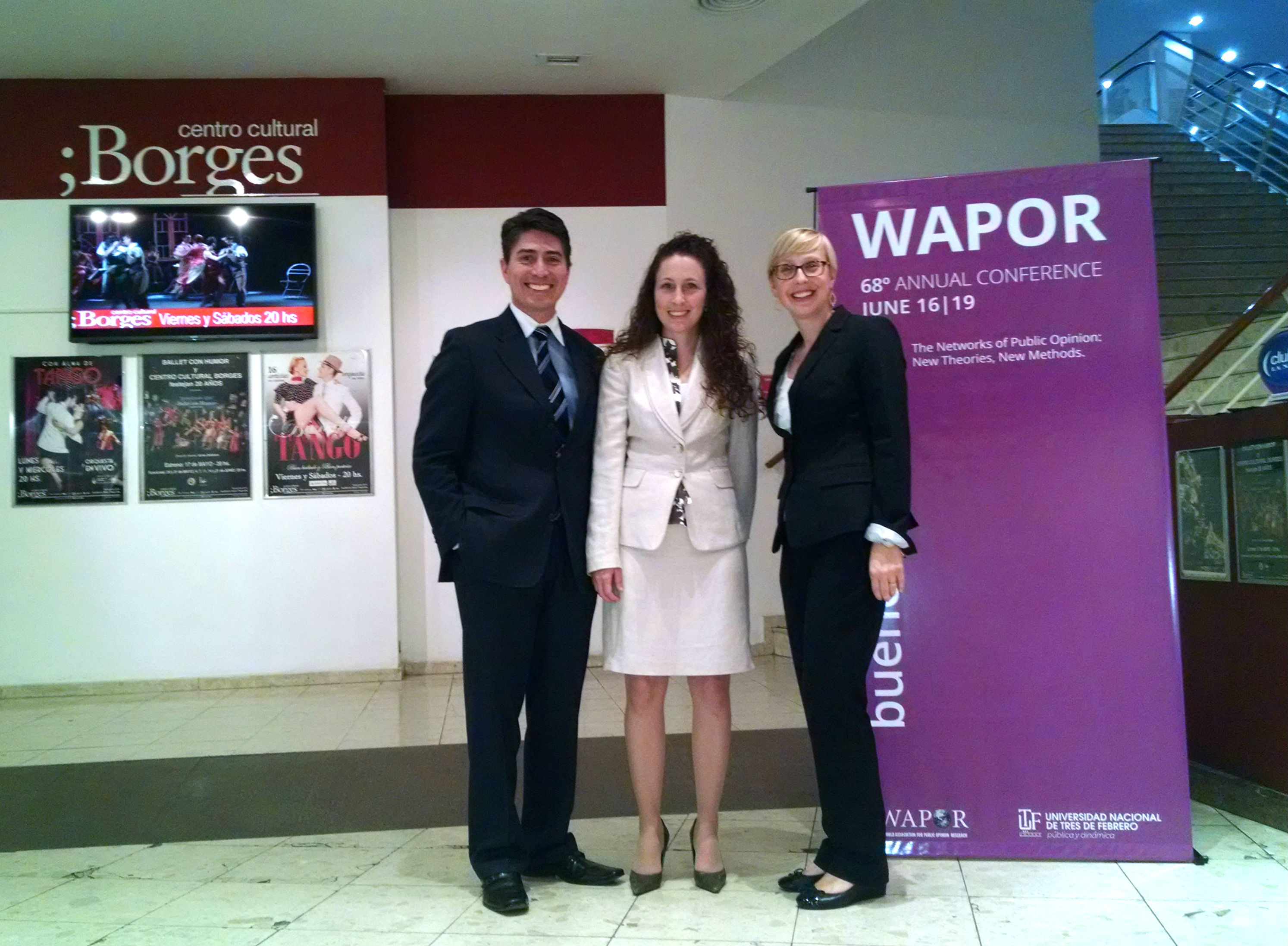 Photo Credit: Wals, Barton, and Hillebrecht standing together after presenting their research